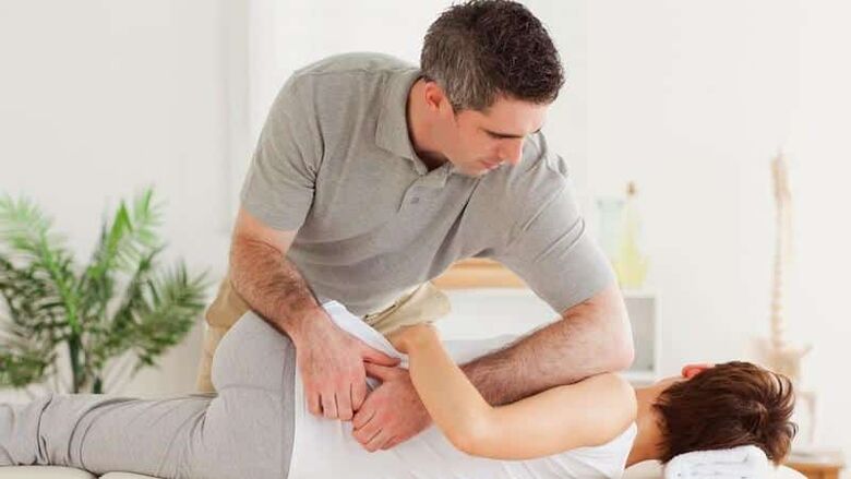 Pain treatment massage in the lower back